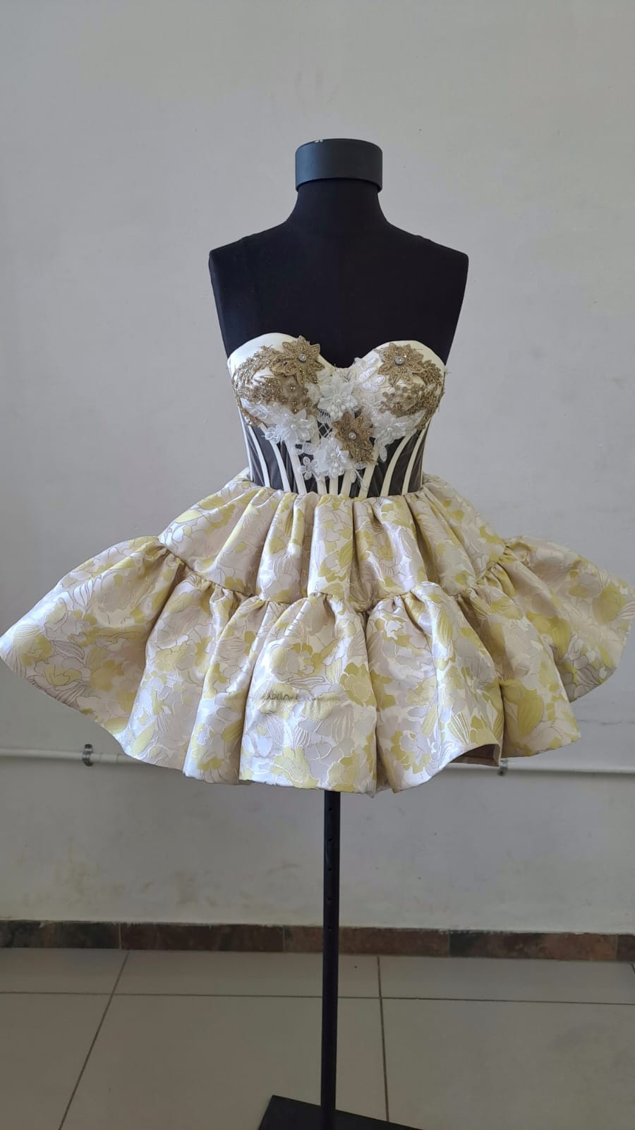 Ivory and gold tiered corset dress by Jane.M